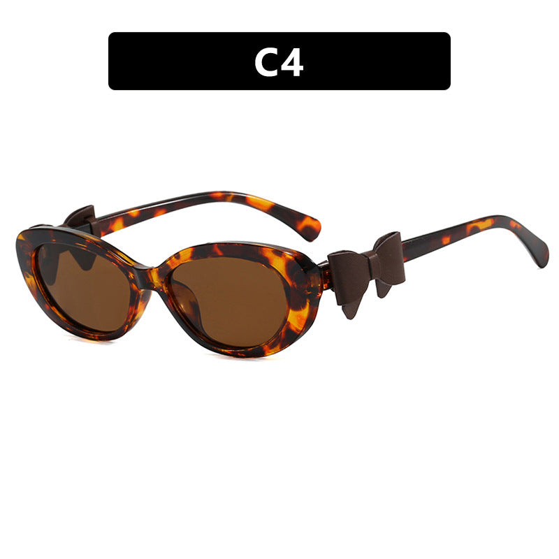 Women's fashionable sunglasses with playful bow design Kalsten