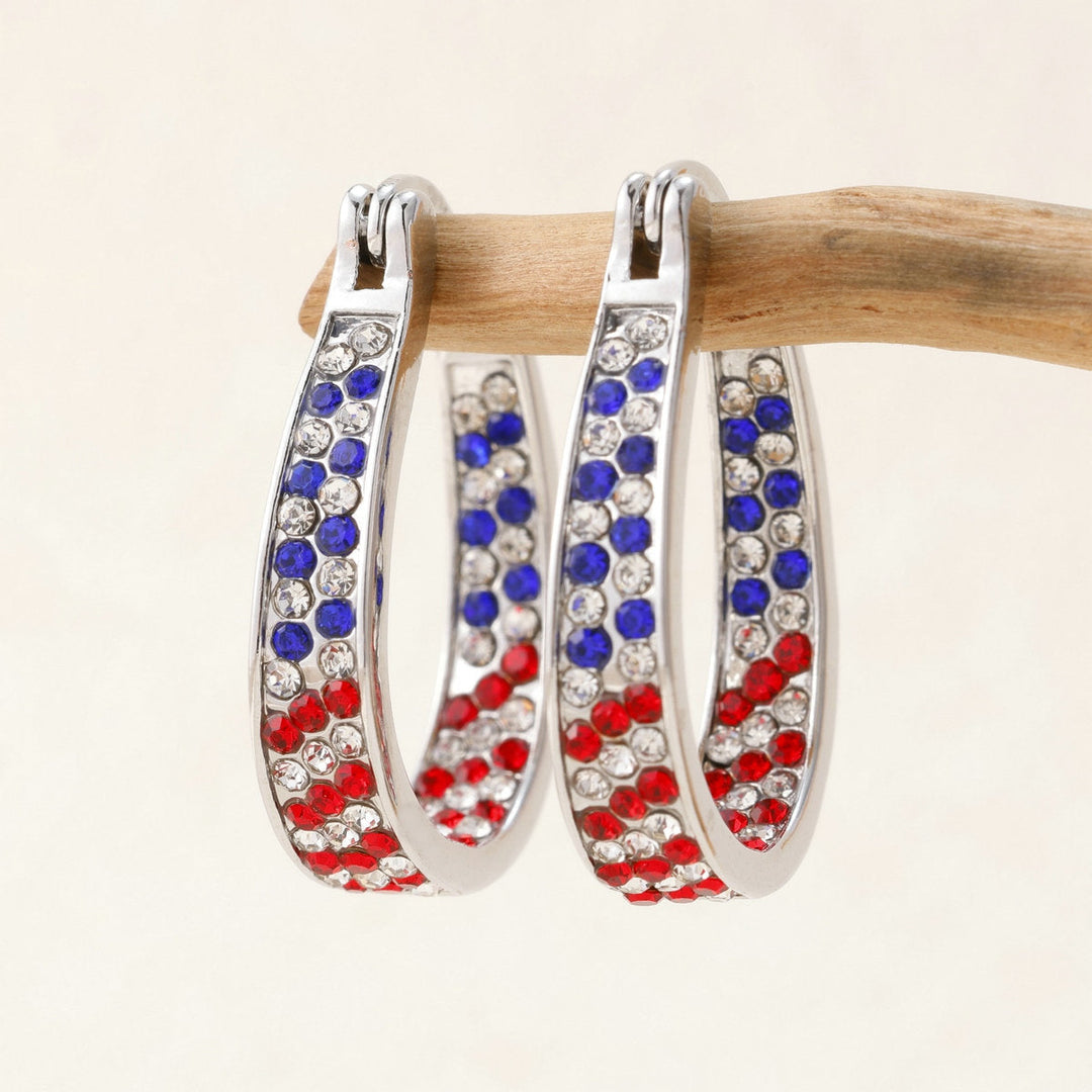 Ladies nano curved clip-on earrings with dense rhinestone embellishment and polished metal alloy Kalsten