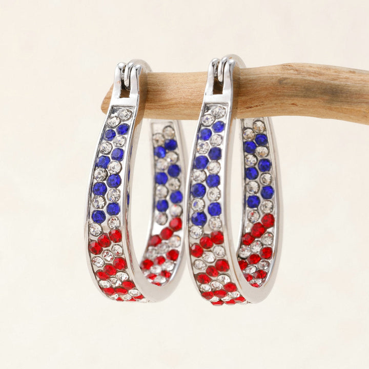 Ladies nano curved clip-on earrings with dense rhinestone embellishment and polished metal alloy Kalsten