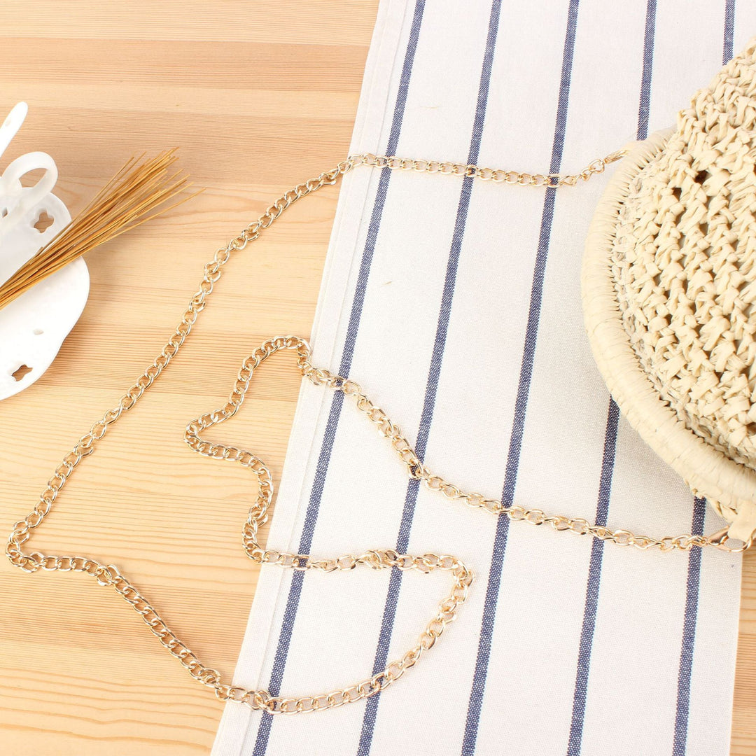 Shoulder bag made from handcrafted natural fibers with elegant chain decoration Kalsten