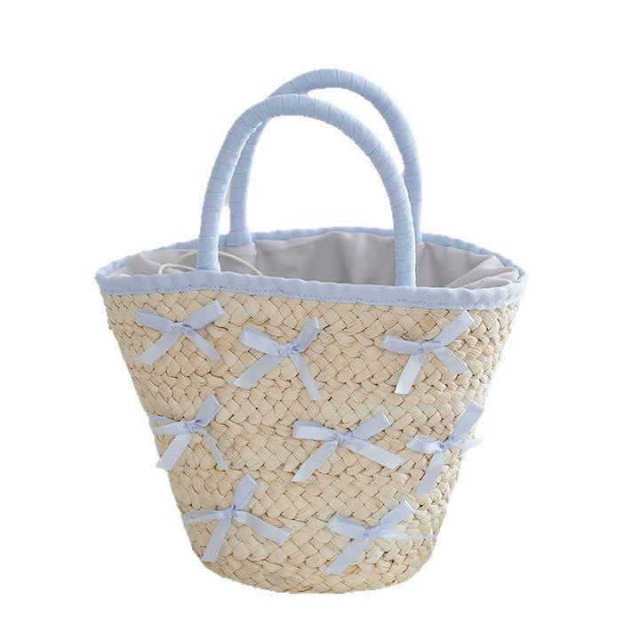 Basket bag with delicate bows and padded edge Kalsten
