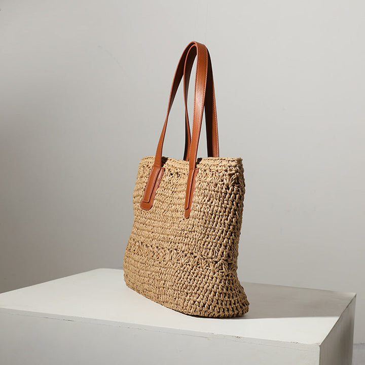 Braided straw bag with sturdy leather handles Kalsten