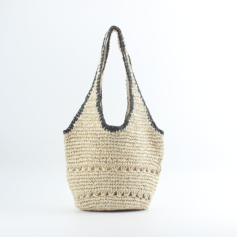 Beach shoulder bag made of hand-woven raffia with elegant lace trims Kalsten