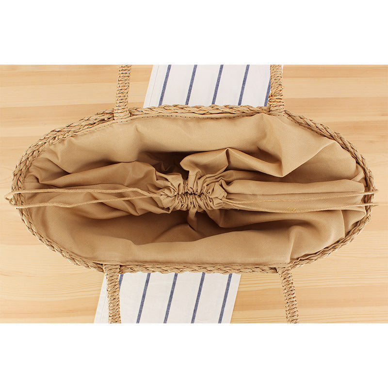Hand-knotted shopping bag made of natural weave with elegant tassel decoration Kalsten