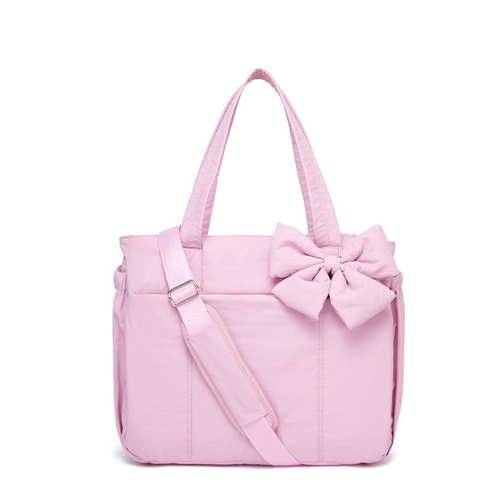 Fashionable tote bag with elegant bow appliqué Kalsten