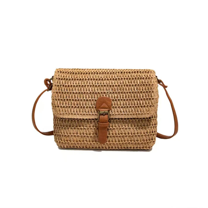 Handbag made of woven natural material with leather accents Kalsten