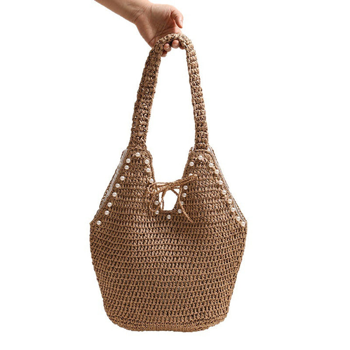 Handbag with pearl decor and innovative closure Kalsten