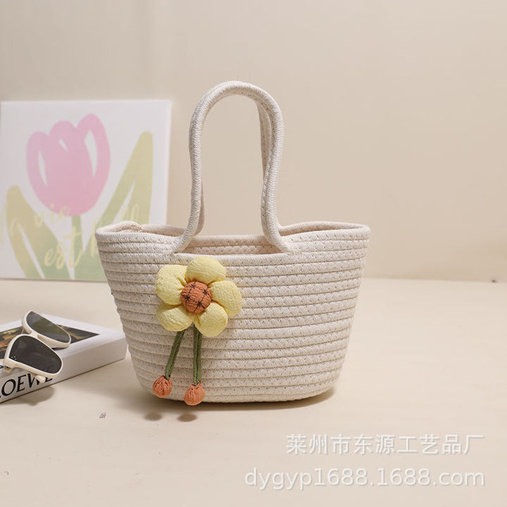 Handcrafted basket bag with floral accents Kalsten