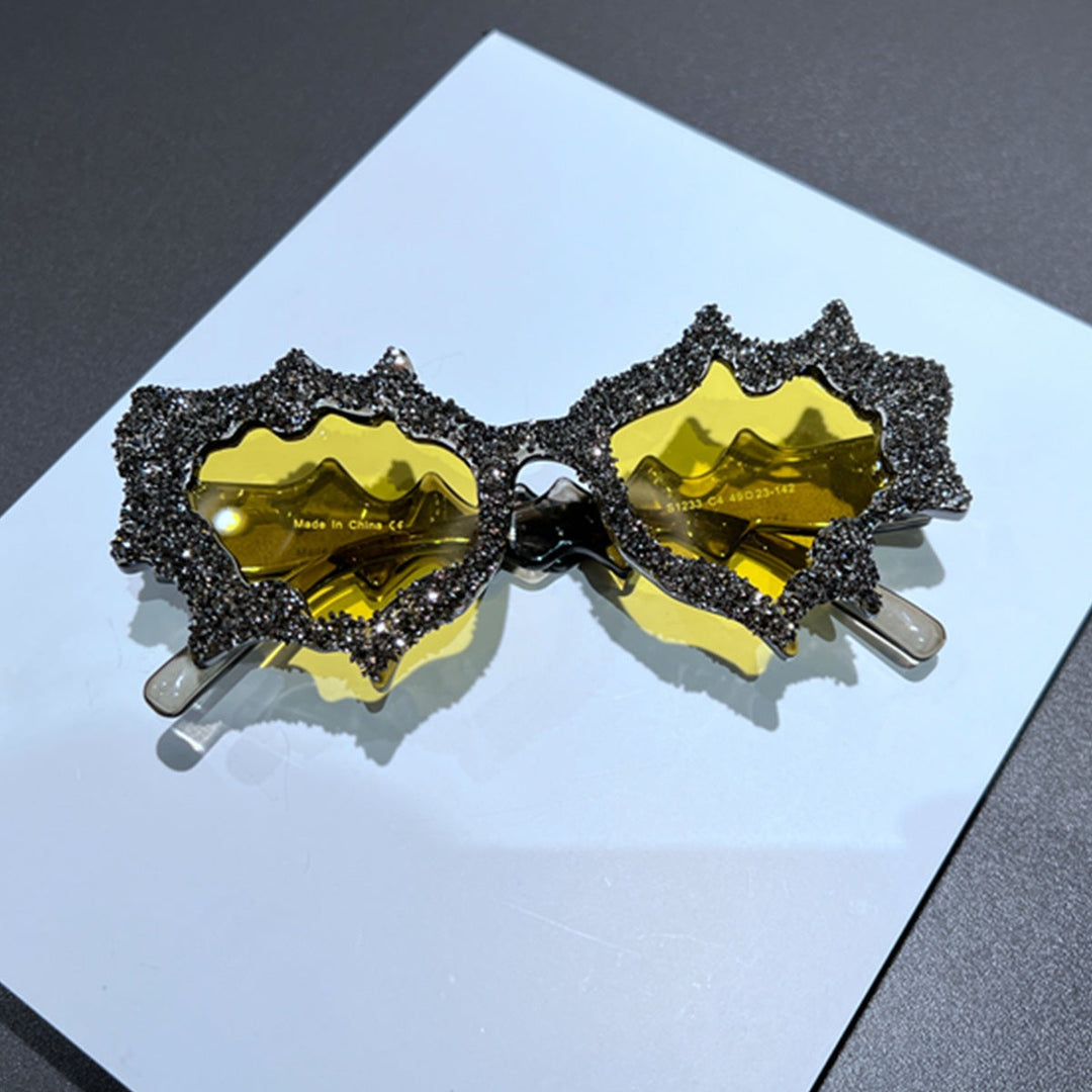 Ladies creative sunglasses in an extravagant design with glitter embellishments Kalsten