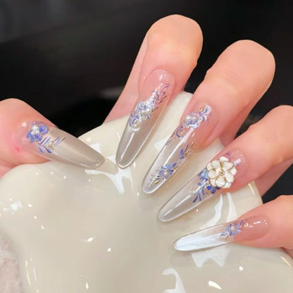 Glamorous artificial nail tips with elegant decorations Acalora