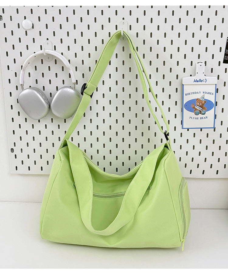 Sporty shoulder bag with spacious interior and sturdy carrying strap Kalsten