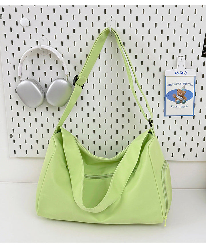 Sporty shoulder bag with spacious interior and sturdy carrying strap Kalsten