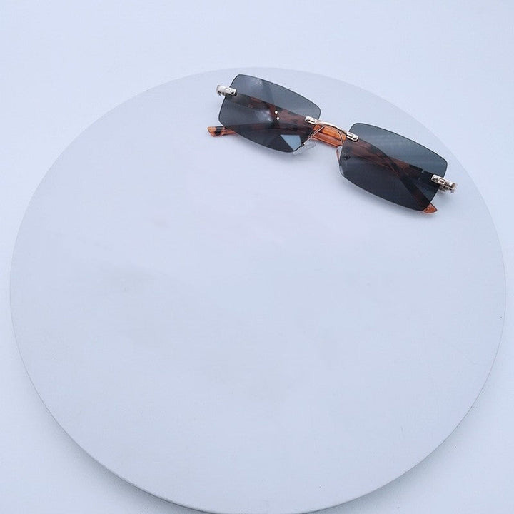 Women's fashionable rectangular sunglasses with unique design feature Kalsten