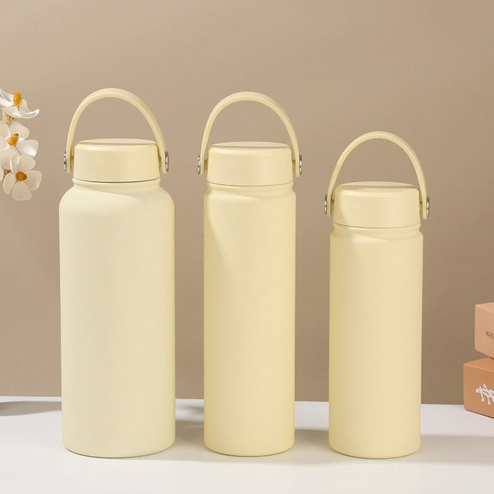 Women's double-walled insulated water bottle with practical carrying handle Kalsten