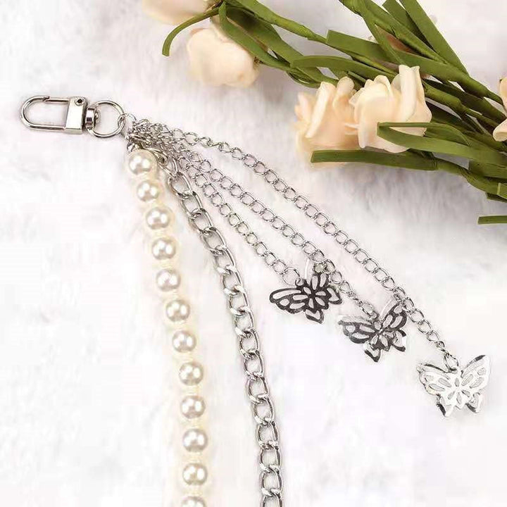 Fashionable belt with pearl and chain pendants Kalsten