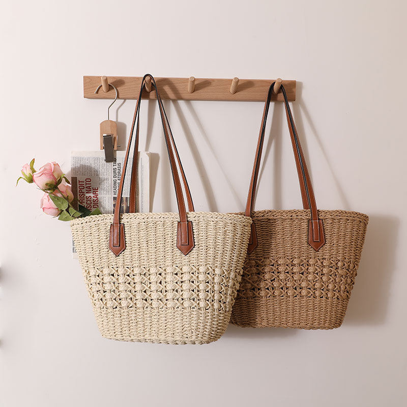 Handcrafted rattan basket bag with elegant leather accents Kalsten