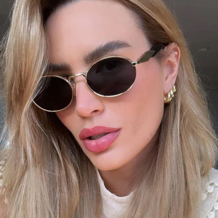 Women's fashionable sunglasses in elegant oval design with trendy accents Kalsten
