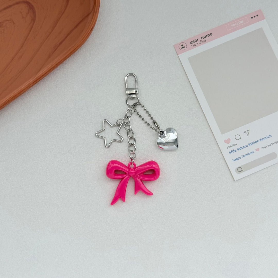 Playful Bow and Star Keychain Kalsten