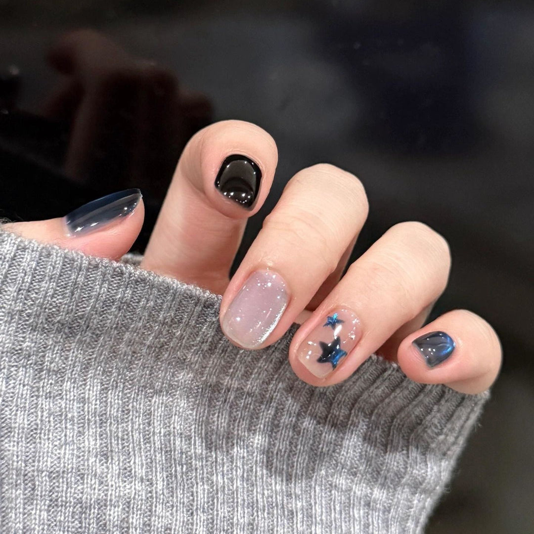 Artificial nails with elegant star design and shimmering effects Kalsten