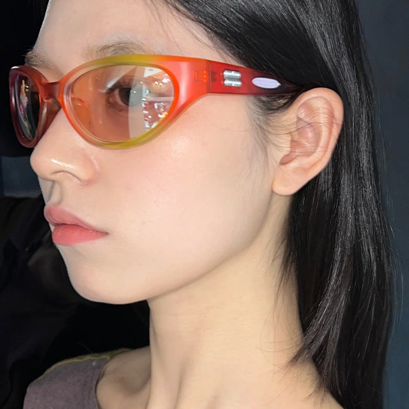 Ladies extravagant sunglasses with curved design Kalsten