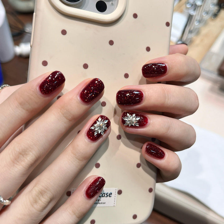 Glamorous artificial nails with rhinestone applications Kalsten