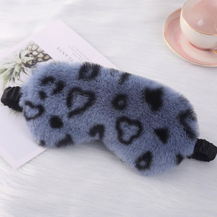 Women's cuddly faux fur sleep mask with heart-embossed surface and gathered comfort band Kalsten