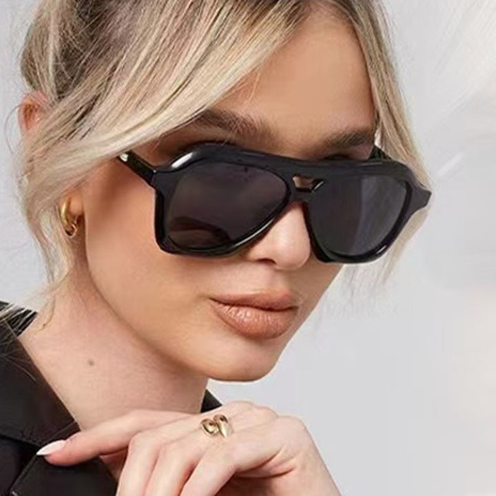 Ladies fashionable sunglasses in innovative design with wide frame Kalsten