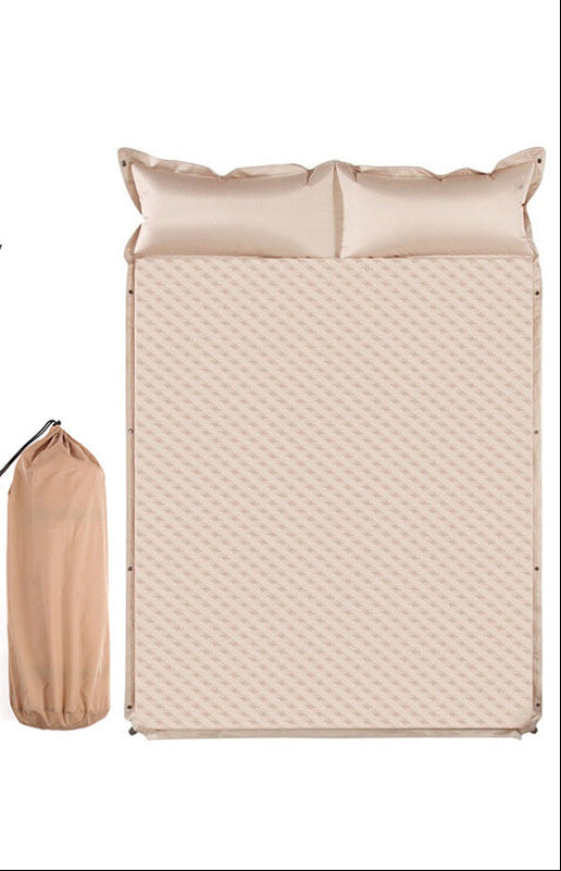 double connectable inflatable camping mattress with integrated dual pillows, egg-crate comfort surface and compact carry sack Kalsten