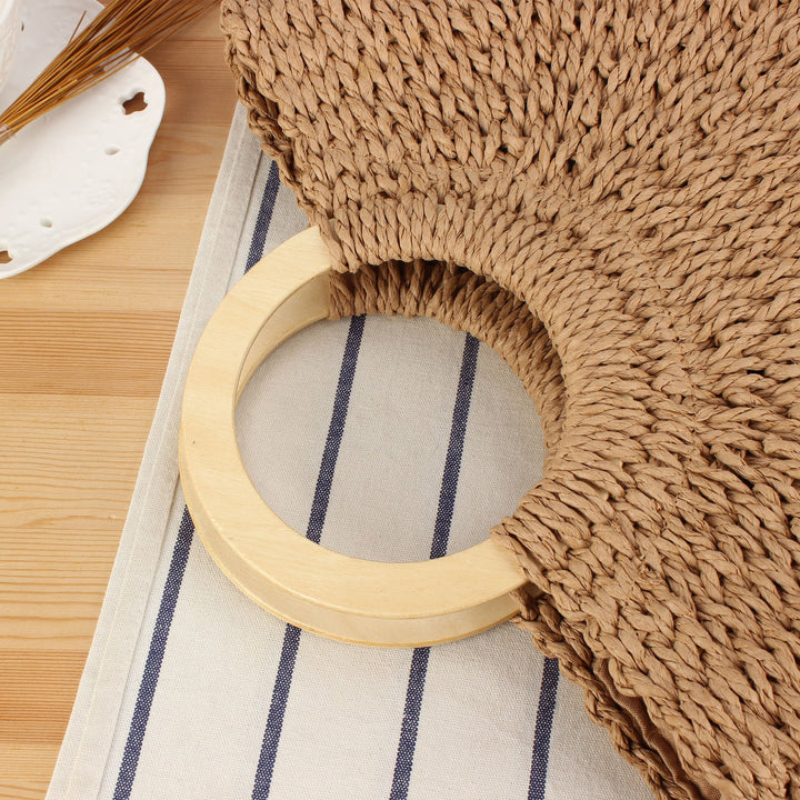 Braided raffia bag with round wooden handles Kalsten