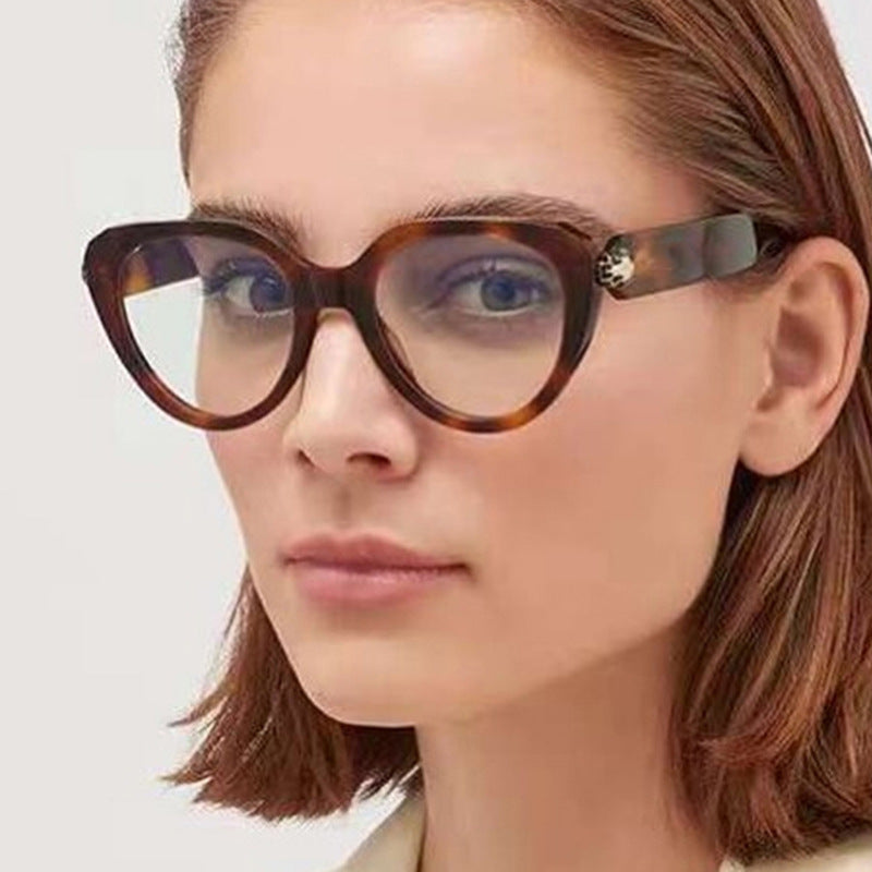 Ladies Cat-Eye Sunglasses with Golden Accents and Protective UV Filter Kalsten