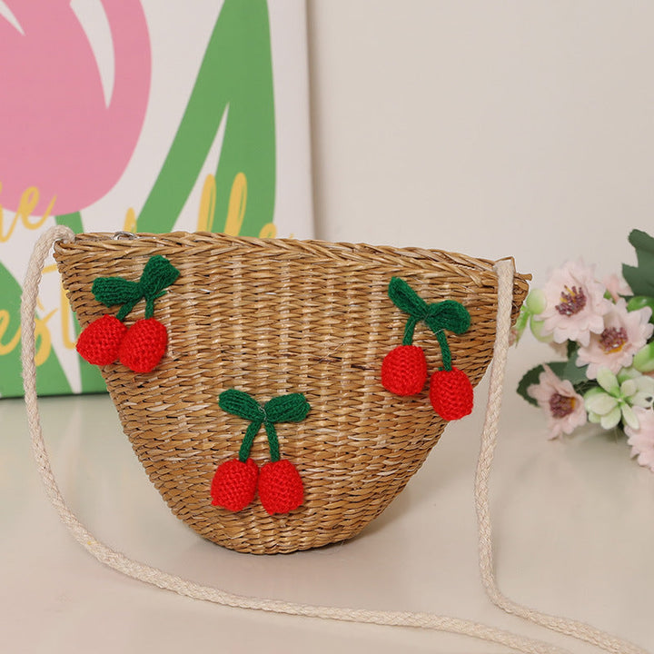 Playful straw shoulder bag with floral accents Kalsten