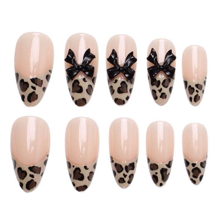 Artificial nail tips with elegant leopard pattern and bow decoration Kalsten