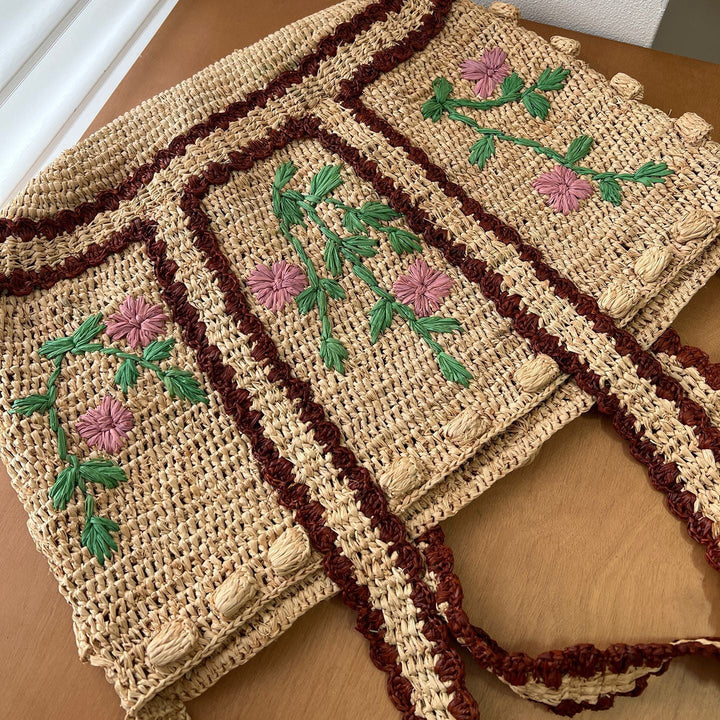 Braided shoulder bag with floral motif Kalsten