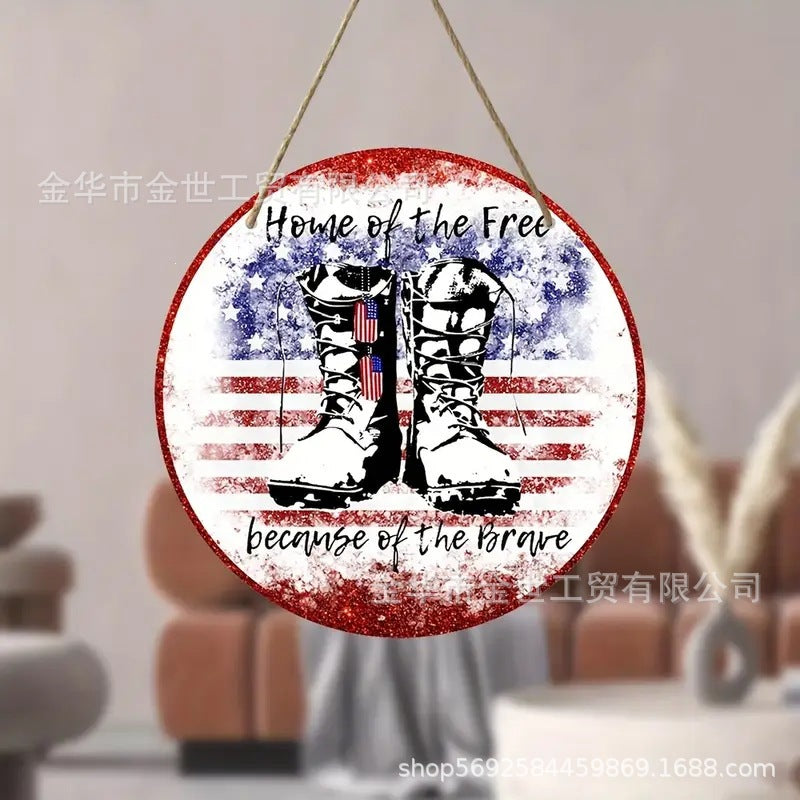 Independence Day rustic round wooden patriotic cross wall plaque with floral accents and God Bless America banner Kalsten