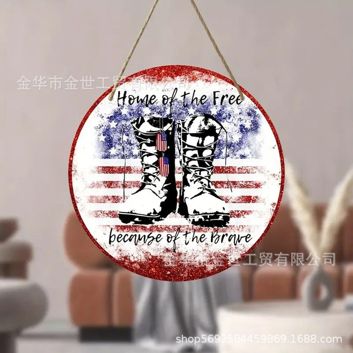 Independence Day rustic round wooden patriotic cross wall plaque with floral accents and God Bless America banner Kalsten