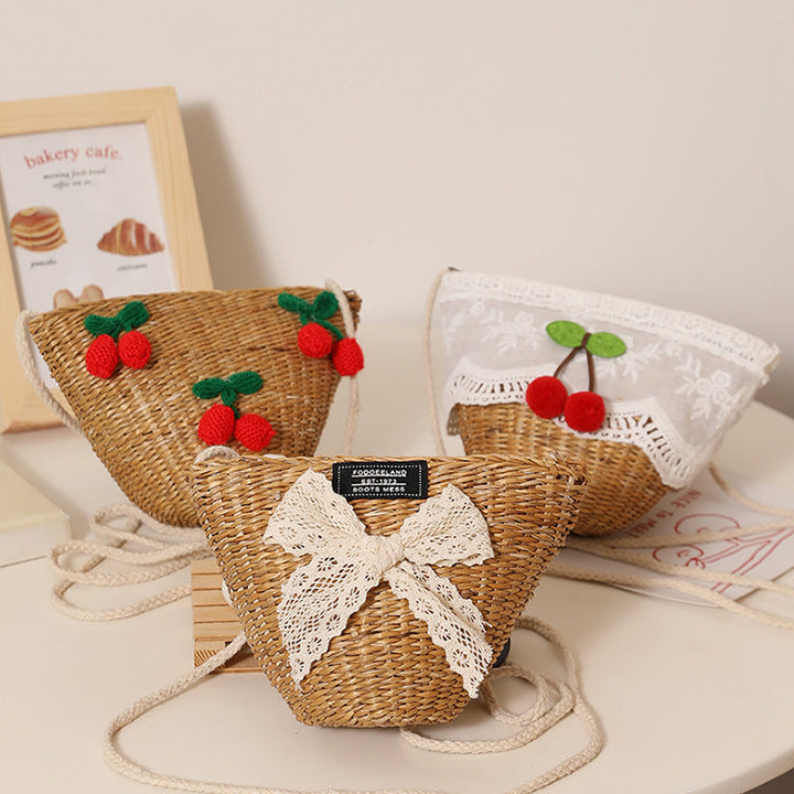 Playful straw shoulder bag with floral accents Kalsten