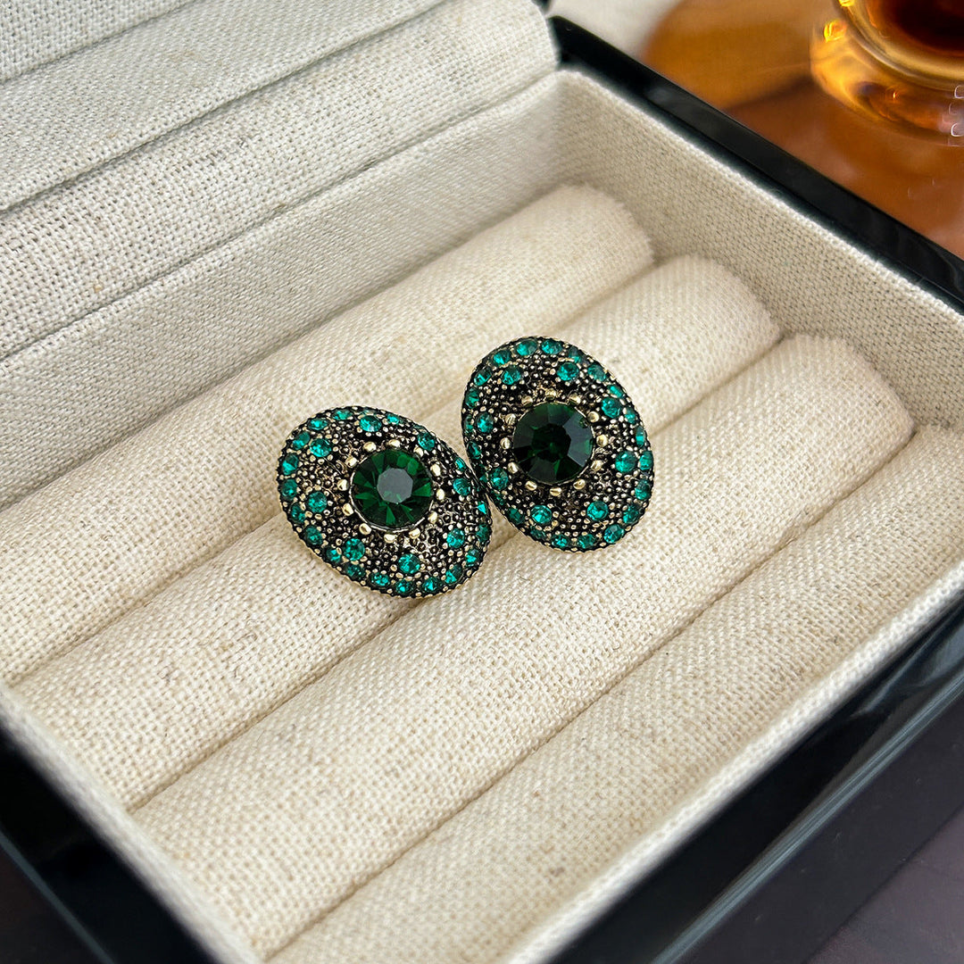 Sparkling stud earrings with intricate details Kalsten