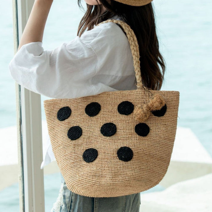 Handcrafted straw bag with eye-catching accents Kalsten