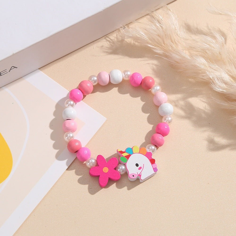 Playful children's bracelet with unicorn and flower motif Kalsten