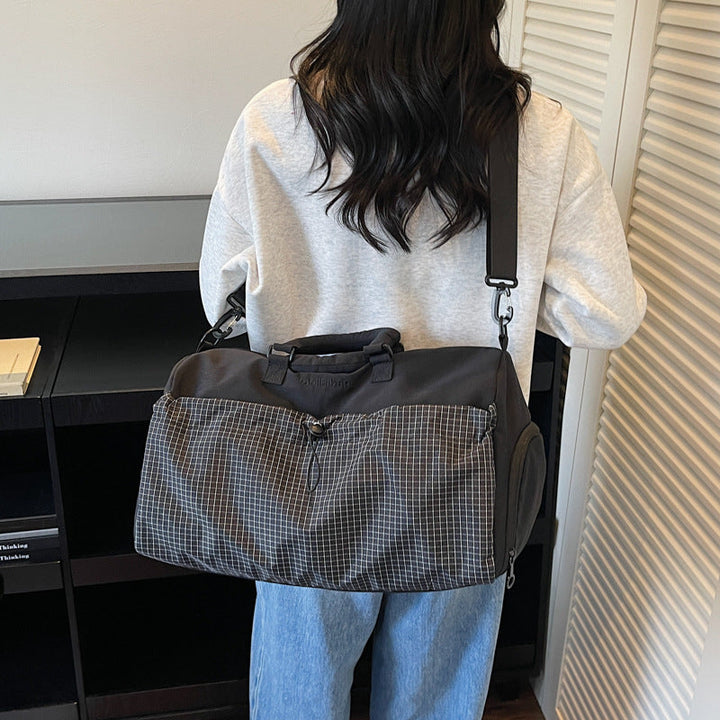 Sporty travel bag with padded carrying handle Kalsten