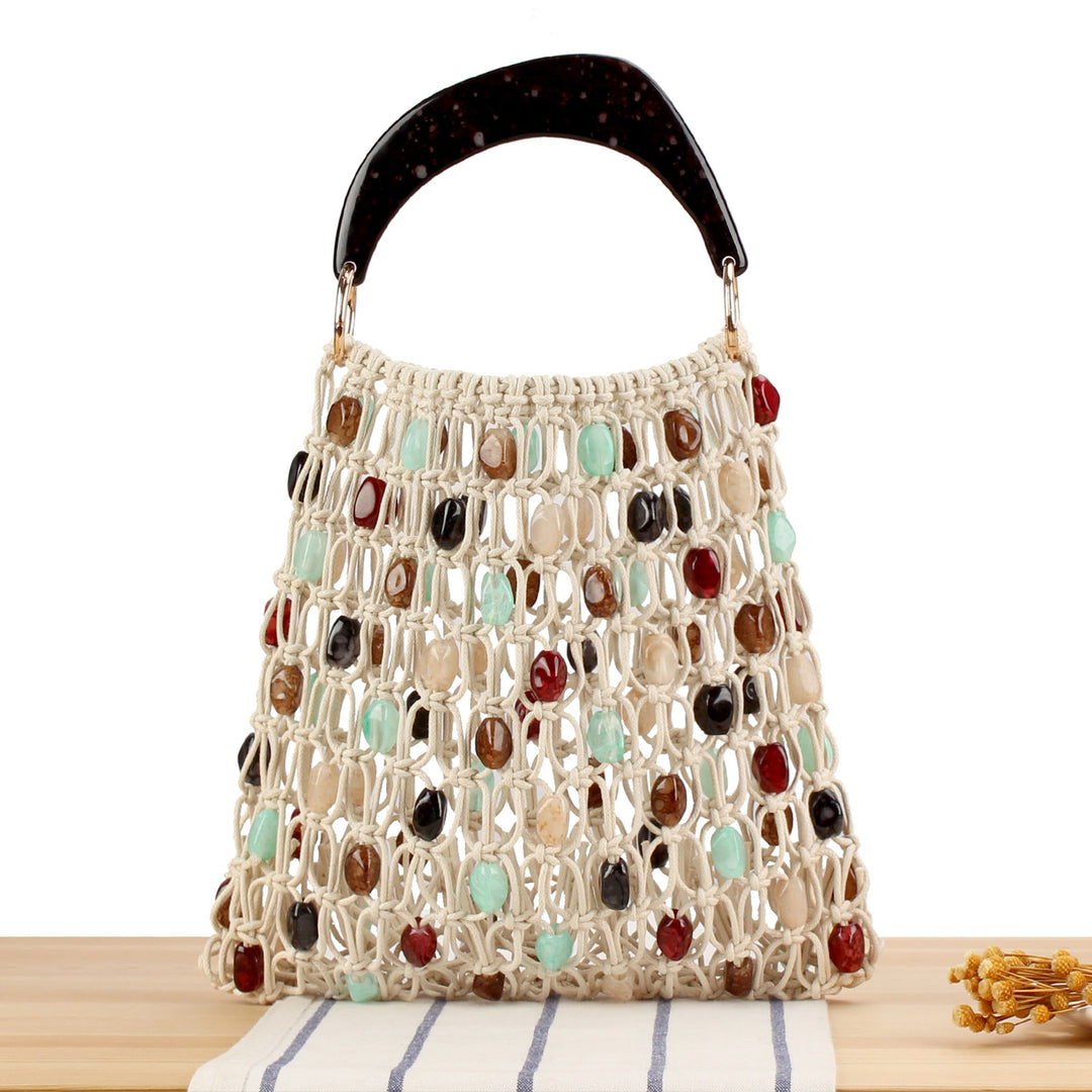 Fashionable handbag in creative net design with colorful accents Kalsten