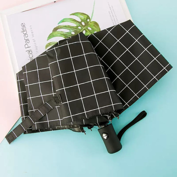 Women's Folding Umbrella with Elegant Feather Design Kalsten