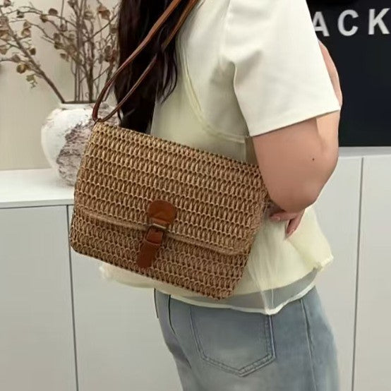Handbag made of woven natural material with leather accents Kalsten