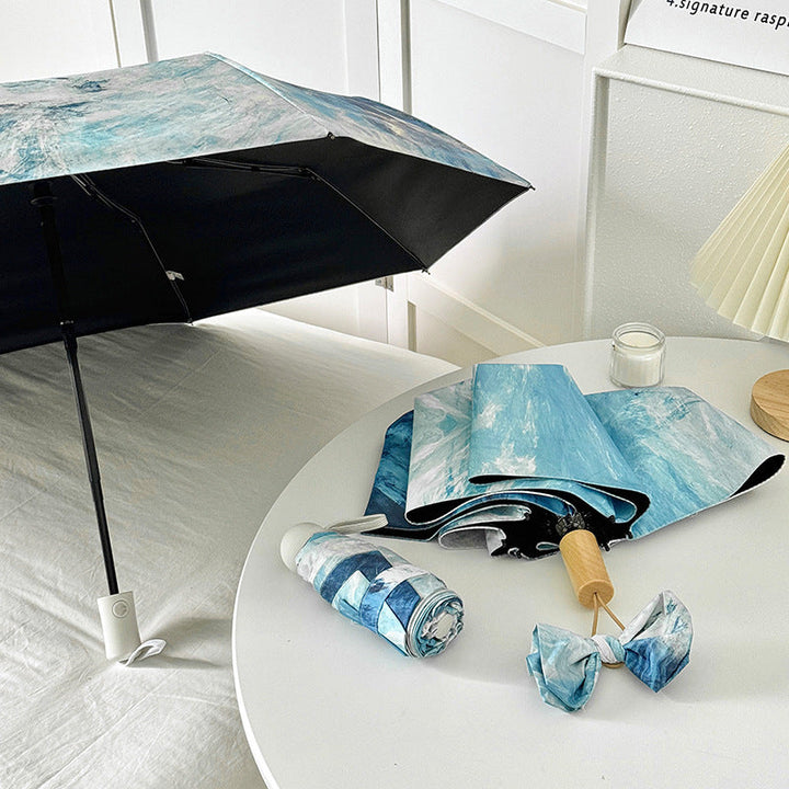 Ladies elegant folding umbrella with unique marble pattern Kalsten