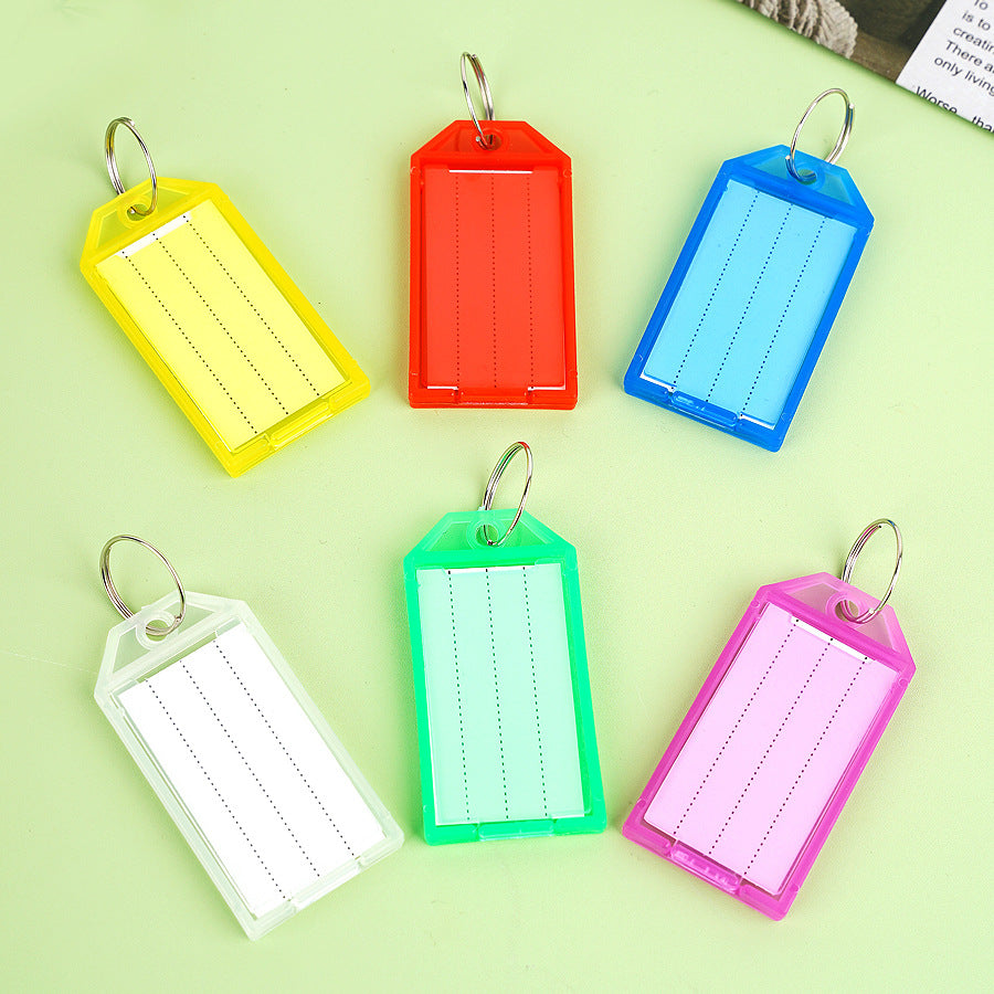 Unisex label tag with transparent sleeve and three writable fields Kalsten