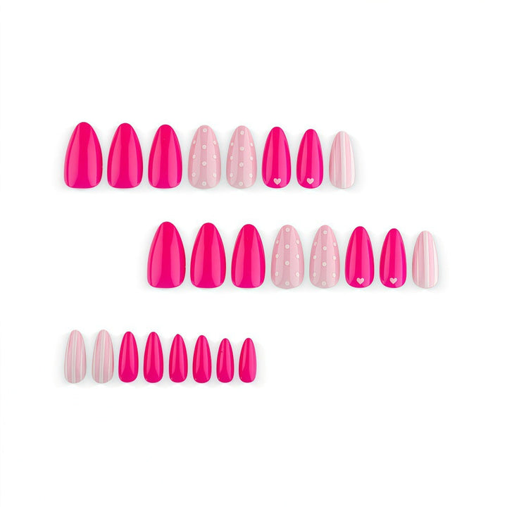 Artificial nails in playful design with hearts and dots Kalsten