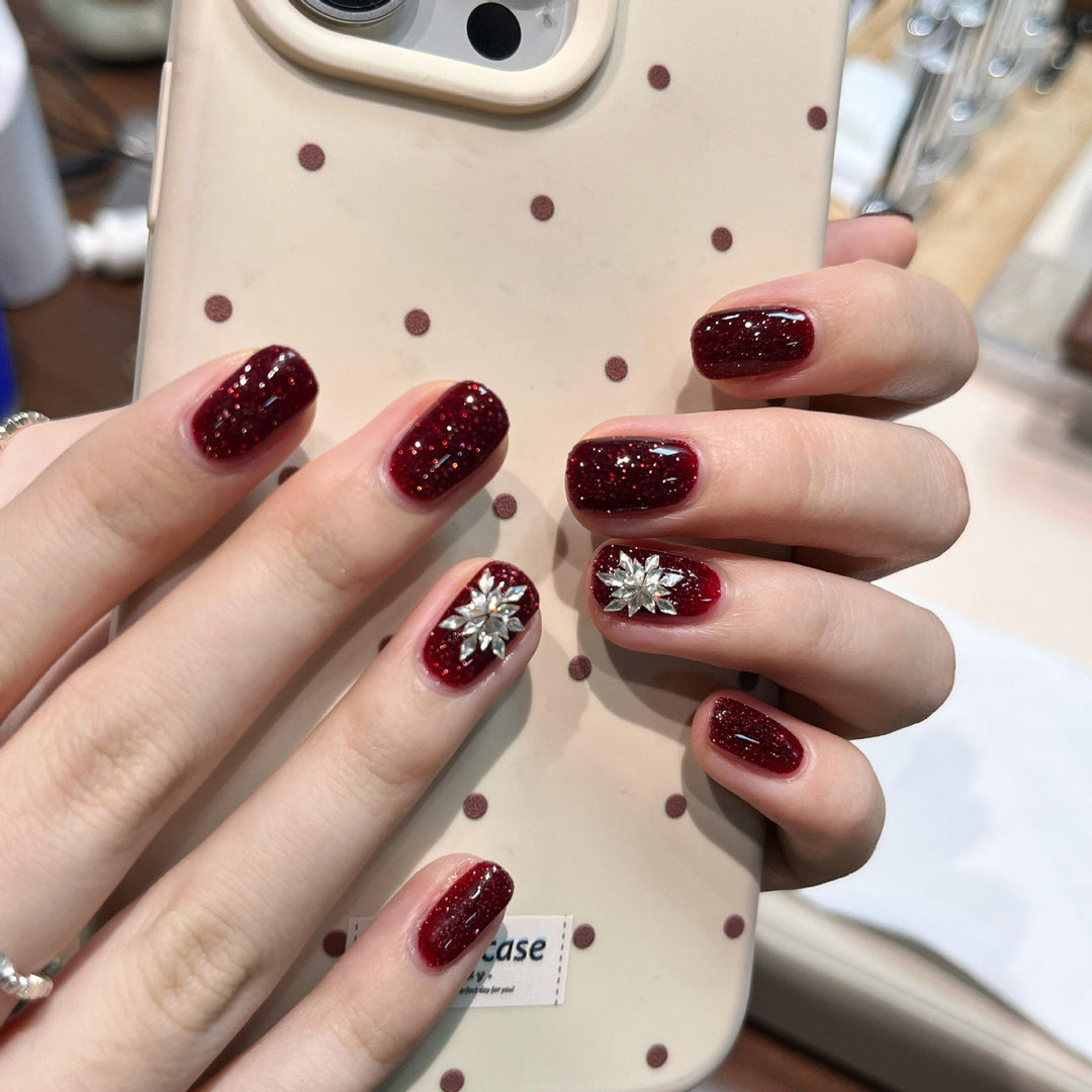 Glamorous artificial nails with rhinestone applications Kalsten