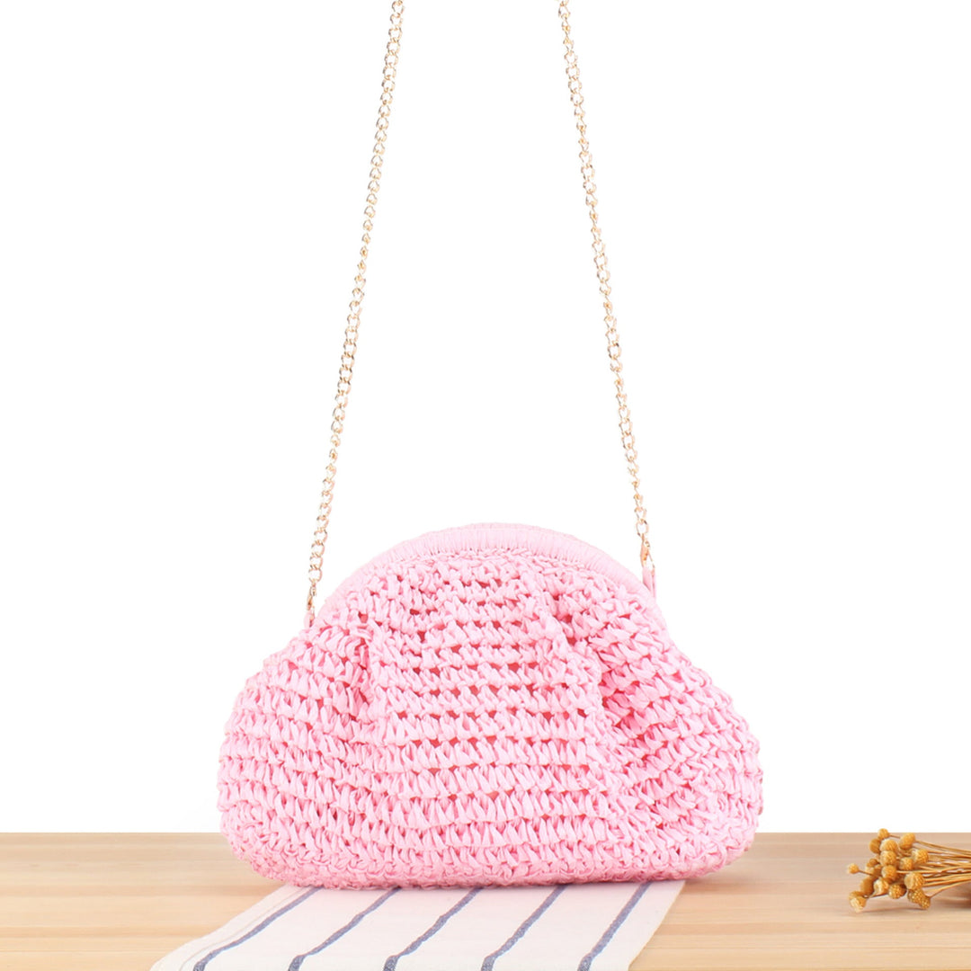 Shoulder bag made from handcrafted natural fibers with elegant chain decoration Kalsten