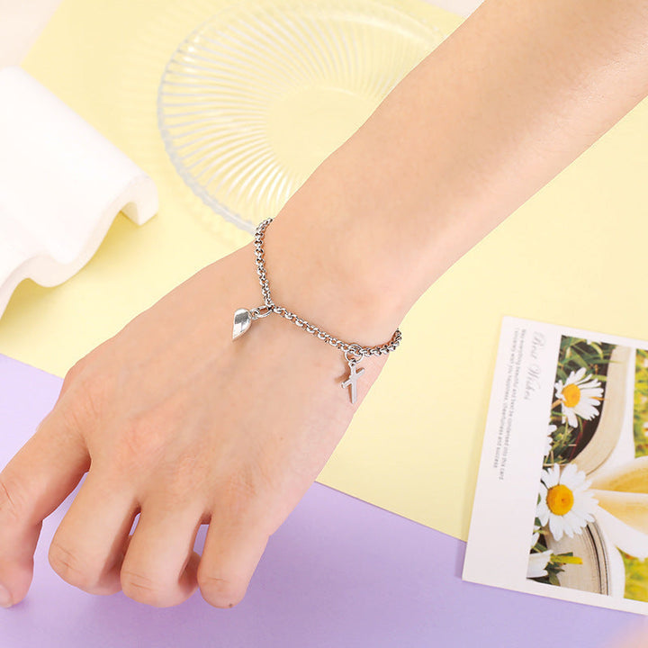 Versatile bracelet with cross and heart pendants Kalsten