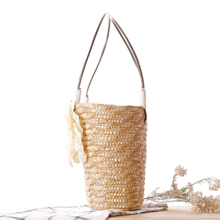 Elegant bast bag with flower appliqué Kalsten